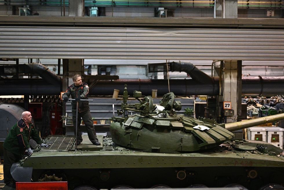 Workers assemble T-90 Armata tanks at the UralVagonZavod machine-building plant in Nizhny Tagil,