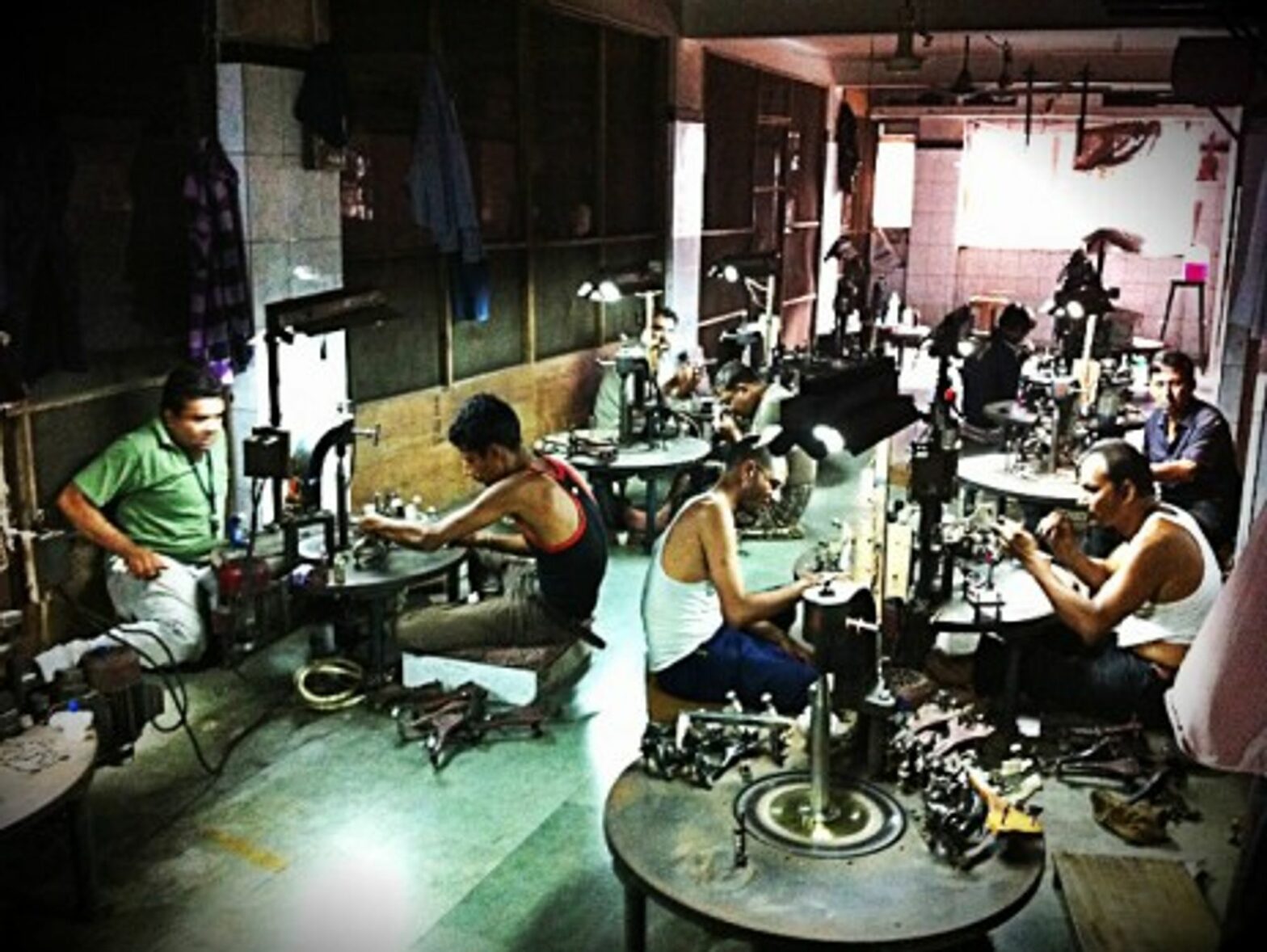 Workers at the Surat diamond factory