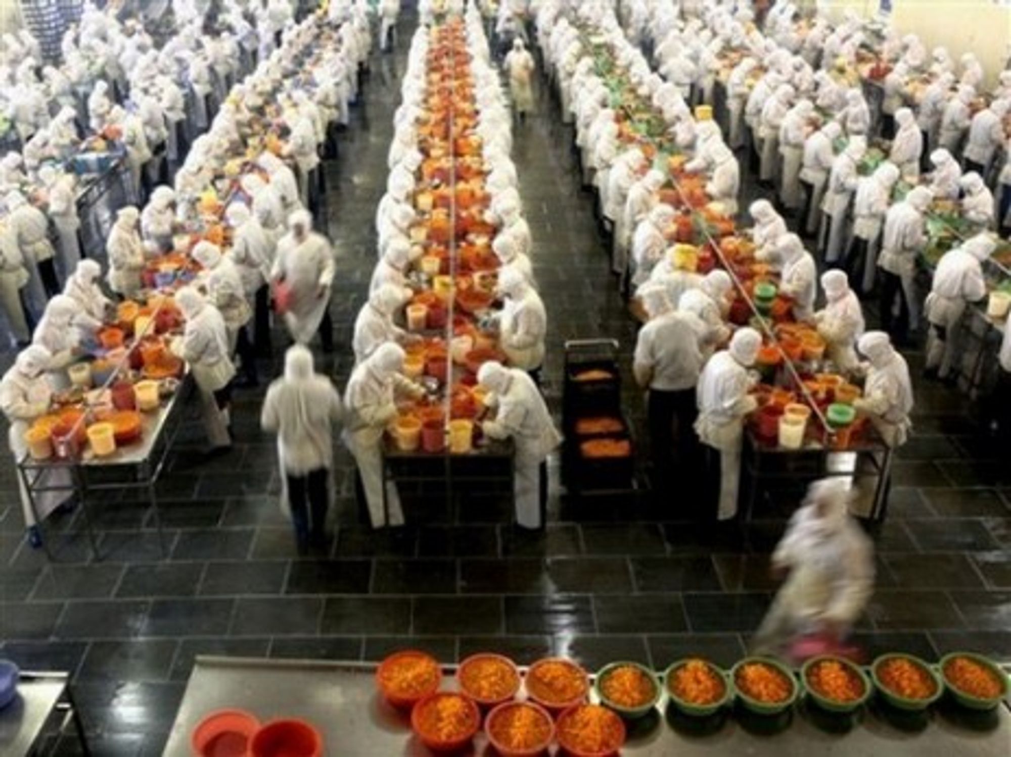 Workers canning tangerines at the Huangyan No 1 Canned Food Factory