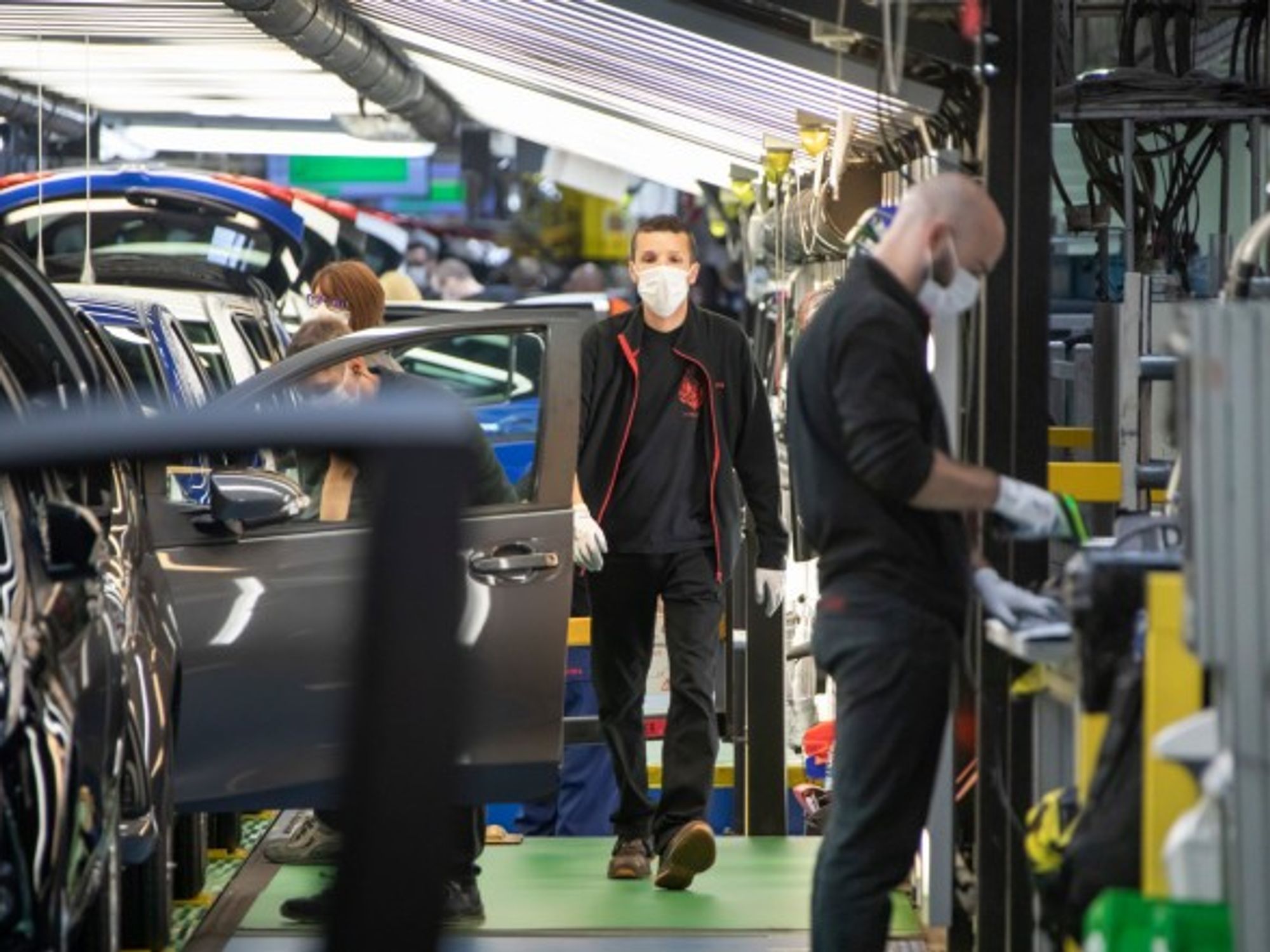 Workers in face masks at a Toyota factory in Valenciennes, France