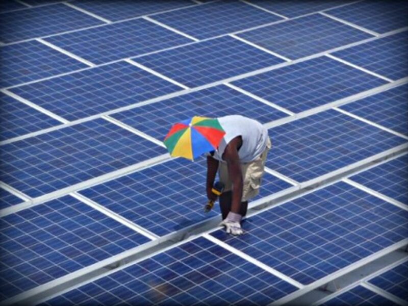 Working on the roof of the University Hospital of Mirebalais