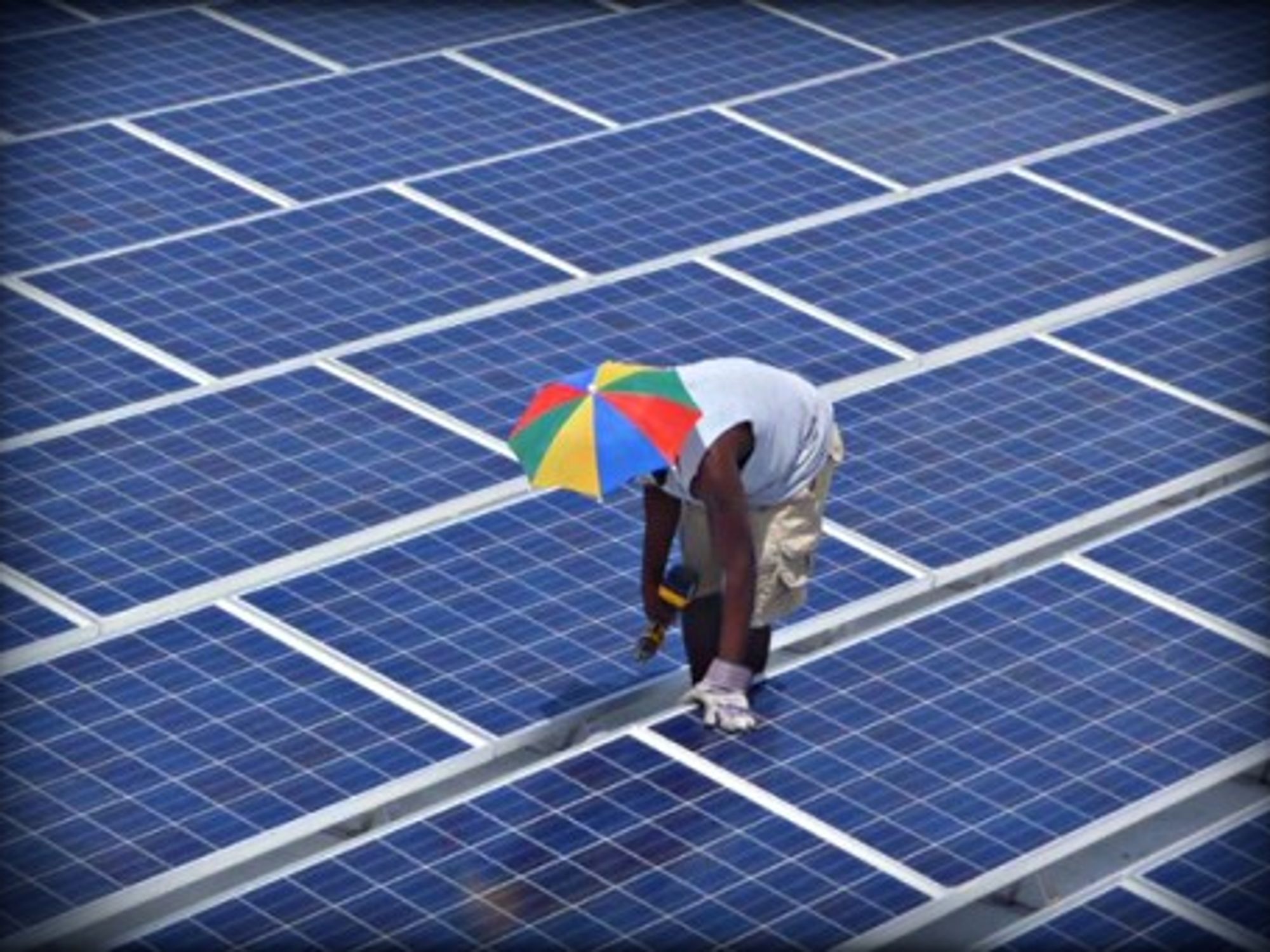 Working on the roof of the University Hospital of Mirebalais
