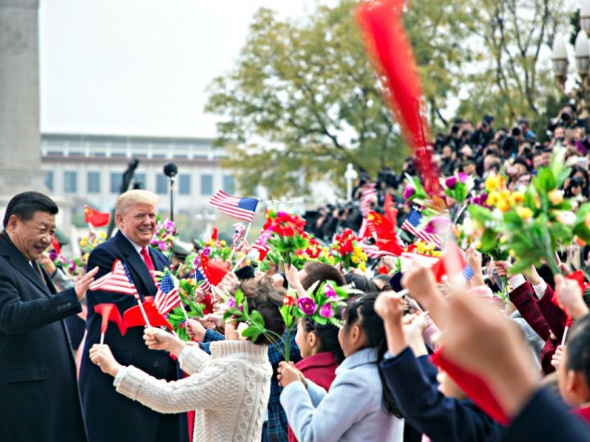 Xi and Trump meet school children last week in Beijing