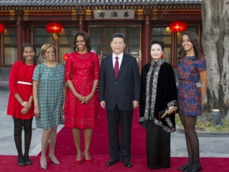Xi Jinping and his wife with Michelle Obama, her mother and her daughters
