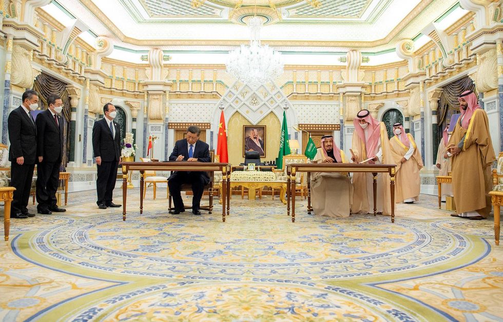 Xi Jinping in Riyadh in early December with Saudi King Salman bin Abdulaziz