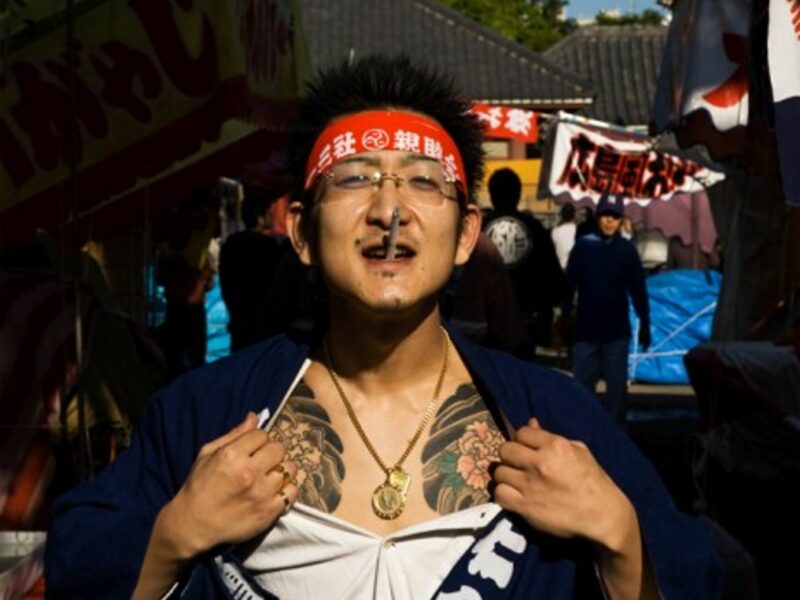Yakuza showing off tattoos at the Sanja Shrine festival in Tokyo