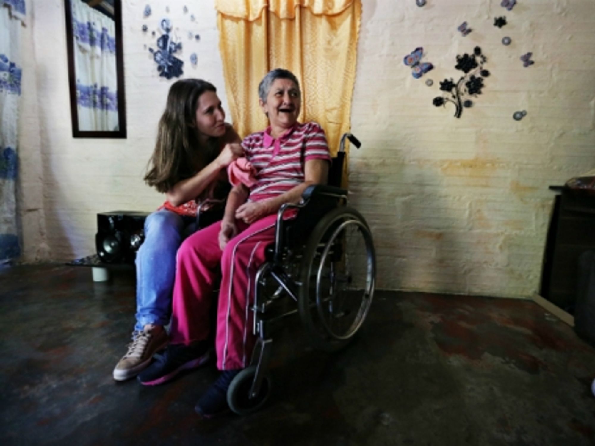 Yaned's mother has Alzheimer's and can no longer walk on her own.