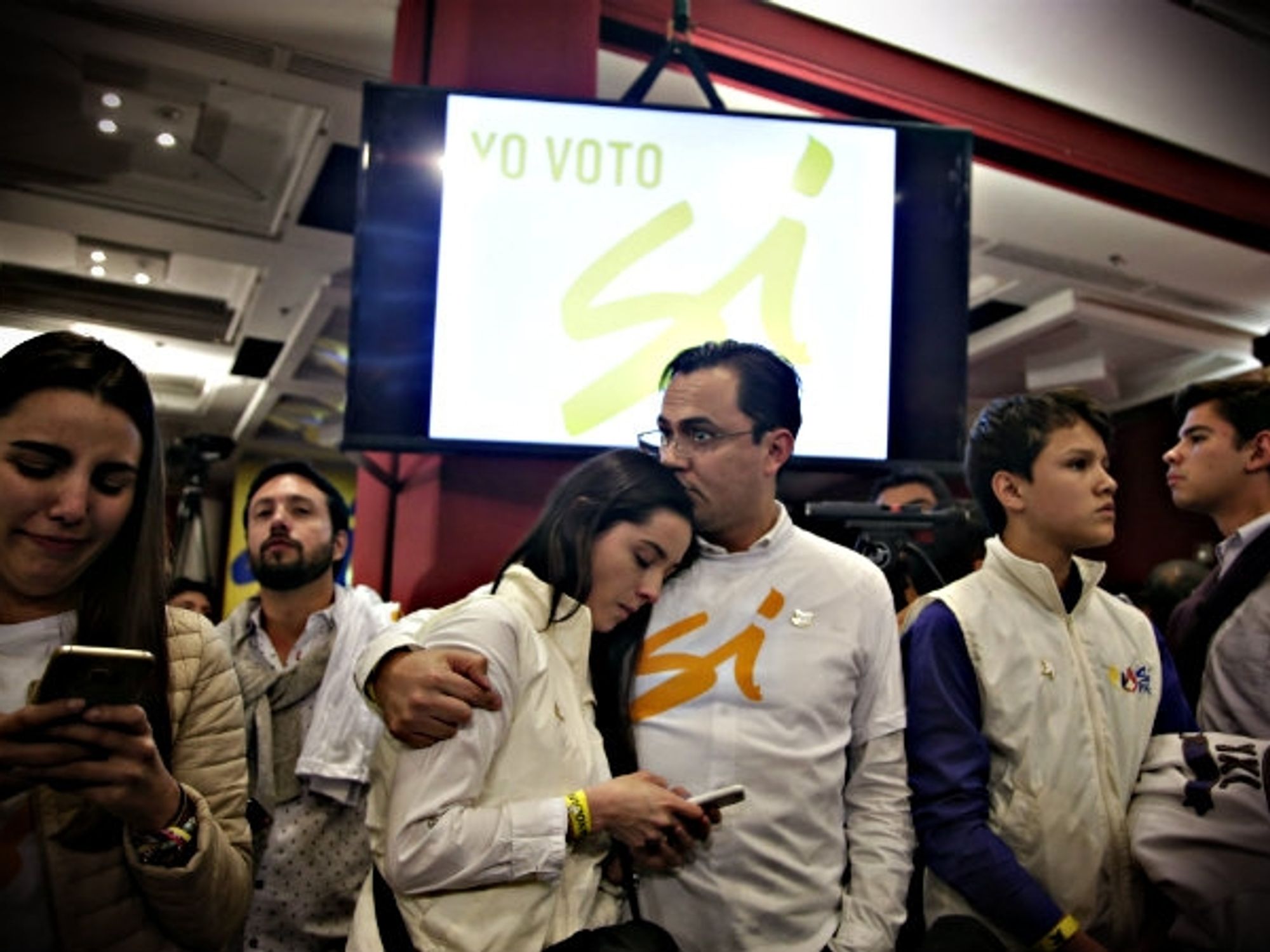 Yes supporters in Bogota react to referendum results Sunday.