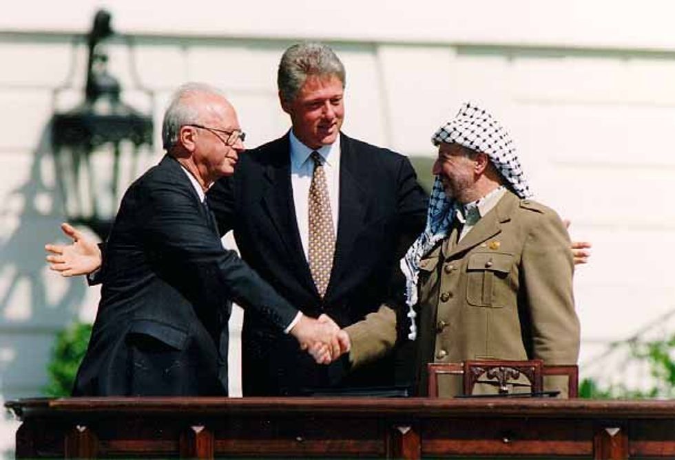 Yitzhak Rabin, Bill Clinton, and Yasser Arafat during the Oslo Accords on 13 September 1993