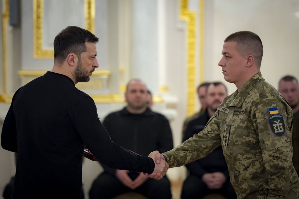 Zelensky honors Ukrainian soldiers last month in Kyiv.