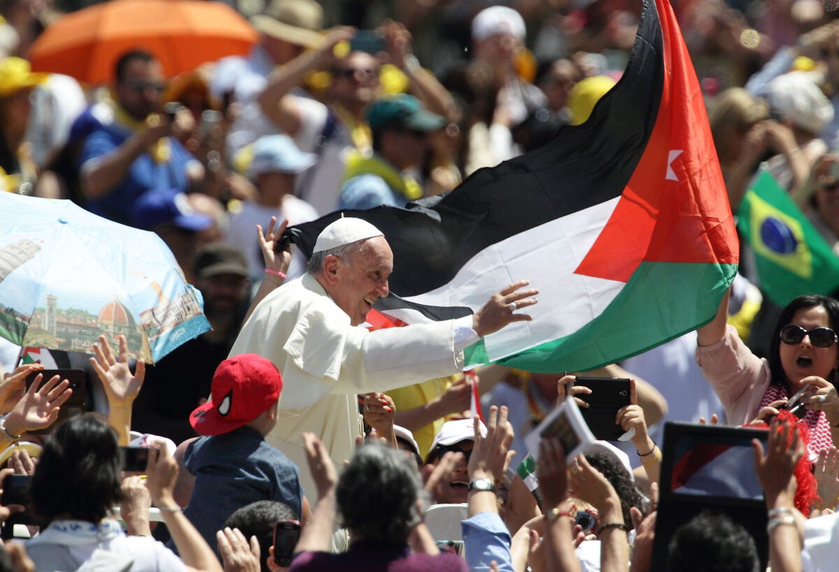 Photo of Pope Francis during a canonization mass in Palestine.