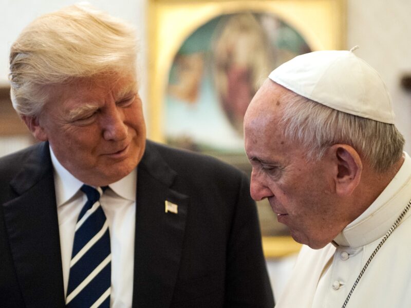 Pope Francis speaks with Donald Trump in 2017.