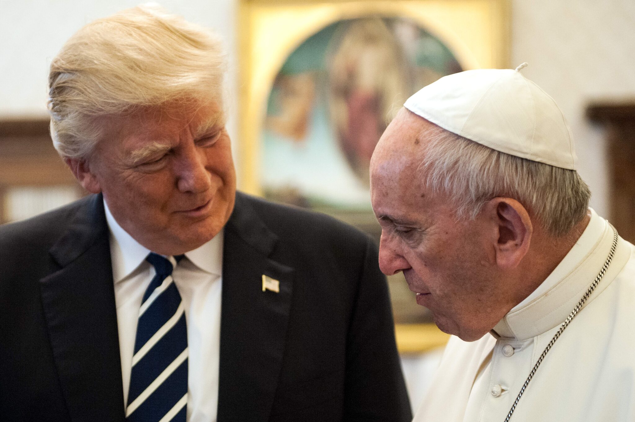Pope Francis speaks with Donald Trump in 2017.