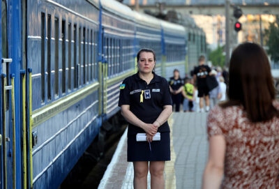 A train attendant stands by the Yellow Ribbon train Odesa - Kramatorsk, launched to support Ukrainians living in the temporarily occupied territories, Odesa, southern Ukraine on June 12, 2024
