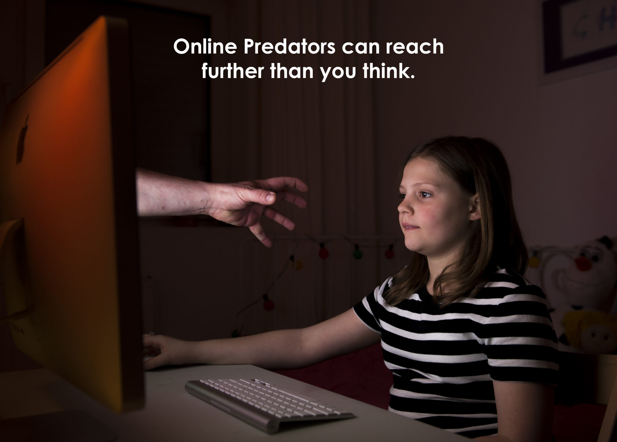 Hand reaching out screen to young girl
