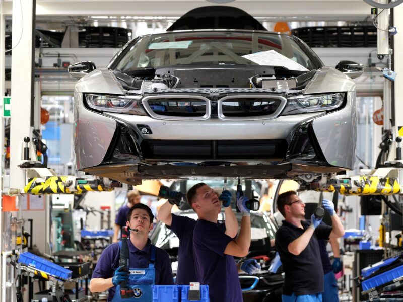 photo of ​BMW staff working on the production of the electric car i3 in the BMW Group factory in Leipzig.