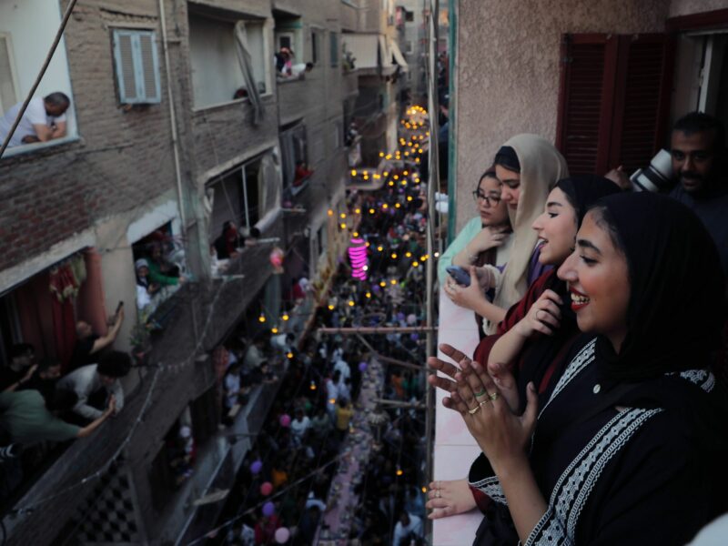 Photo of Egyptian women and girls taking photos as they celebrate Iftar during Ramadan in Cairo