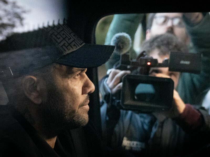 Photo of former soccer player Dani Alves driving a car