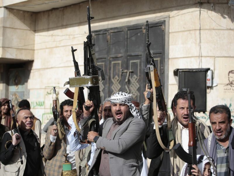 photo of Houthi fighters holding their guns