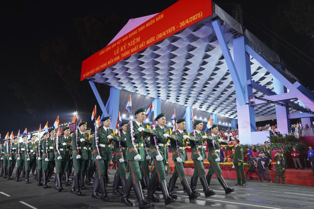 soldiers marching for 50th anniversary of the end of Vietnam War