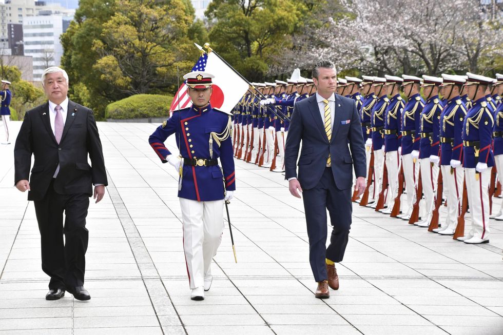 U.S. Defense Secretary Pete Hegseth (R) receives a guard of honor in Tokyo on March 30, 2025. Hegseth held talks with Japanese Defense Minister Gen Nakatani (L) the same day. (Pool photo) (Kyodo).==Kyodo. (Credit Image: © Kyodonews via ZUMA Press)