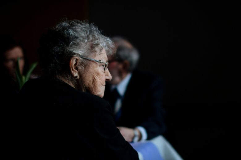 Photo of a woman looking into the distance.