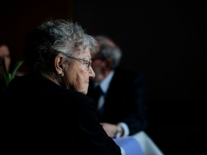 Photo of a woman looking into the distance.