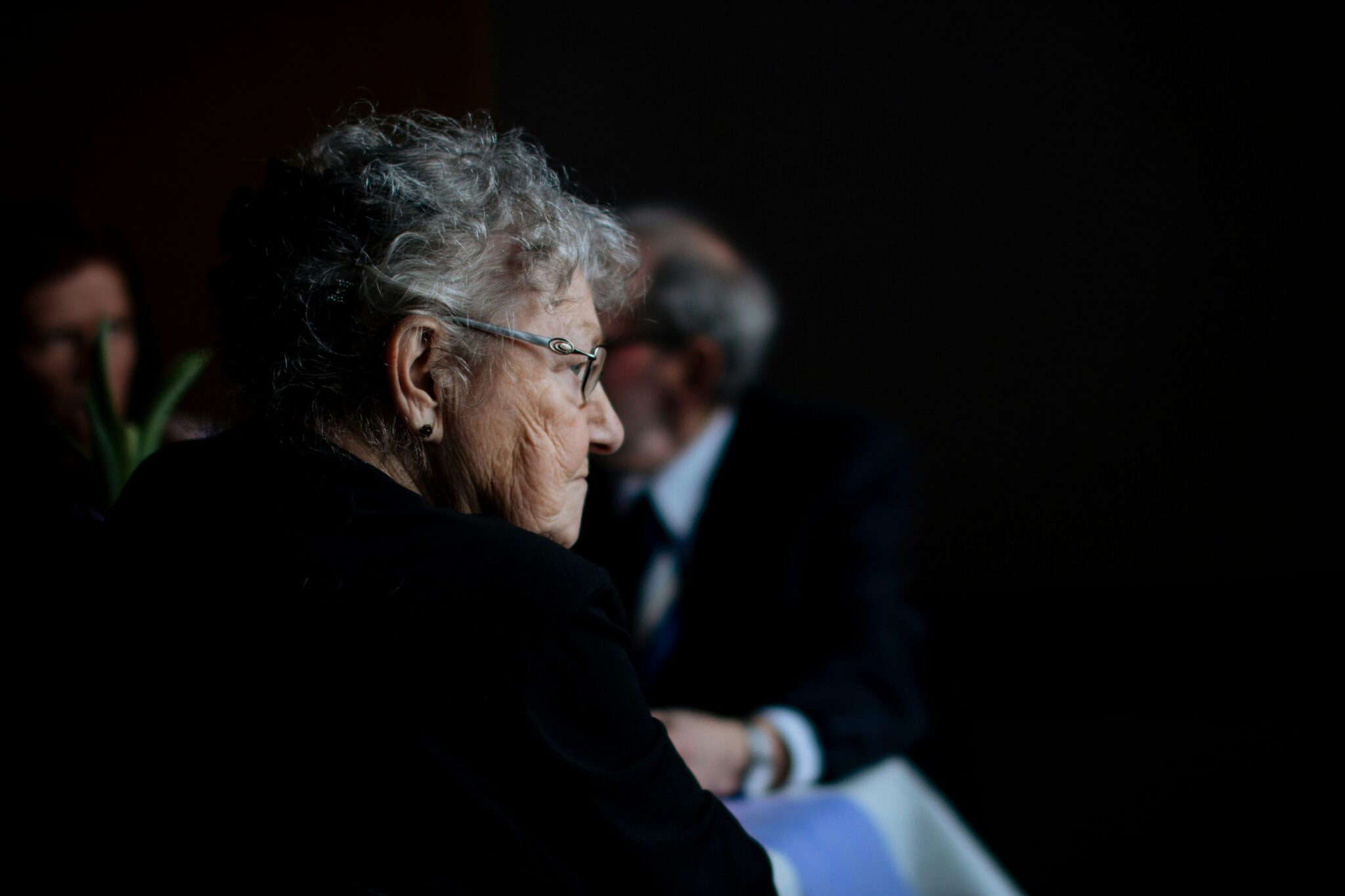 Photo of a woman looking into the distance.