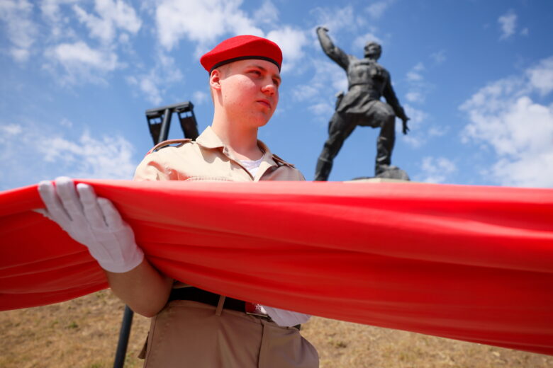 A 100-metre-long Soviet Victory Banner is unfurled at a WWII monument to mark the 80th anniversary of the victory over Nazi Germany in World War II in Lugansk, Russia on May 7, 2025.
