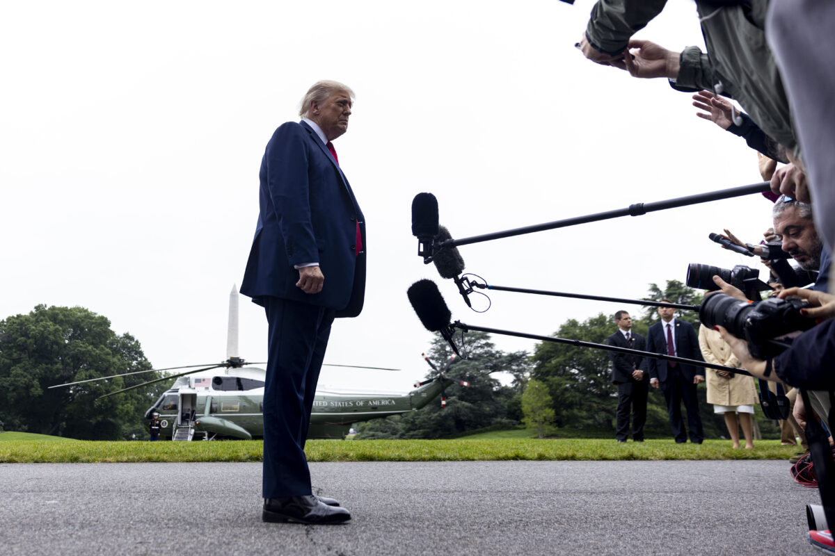 Photo of U.S. President Donald Trump speaks to the press before going to Canada.