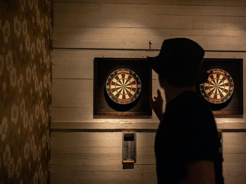 someone playing darts