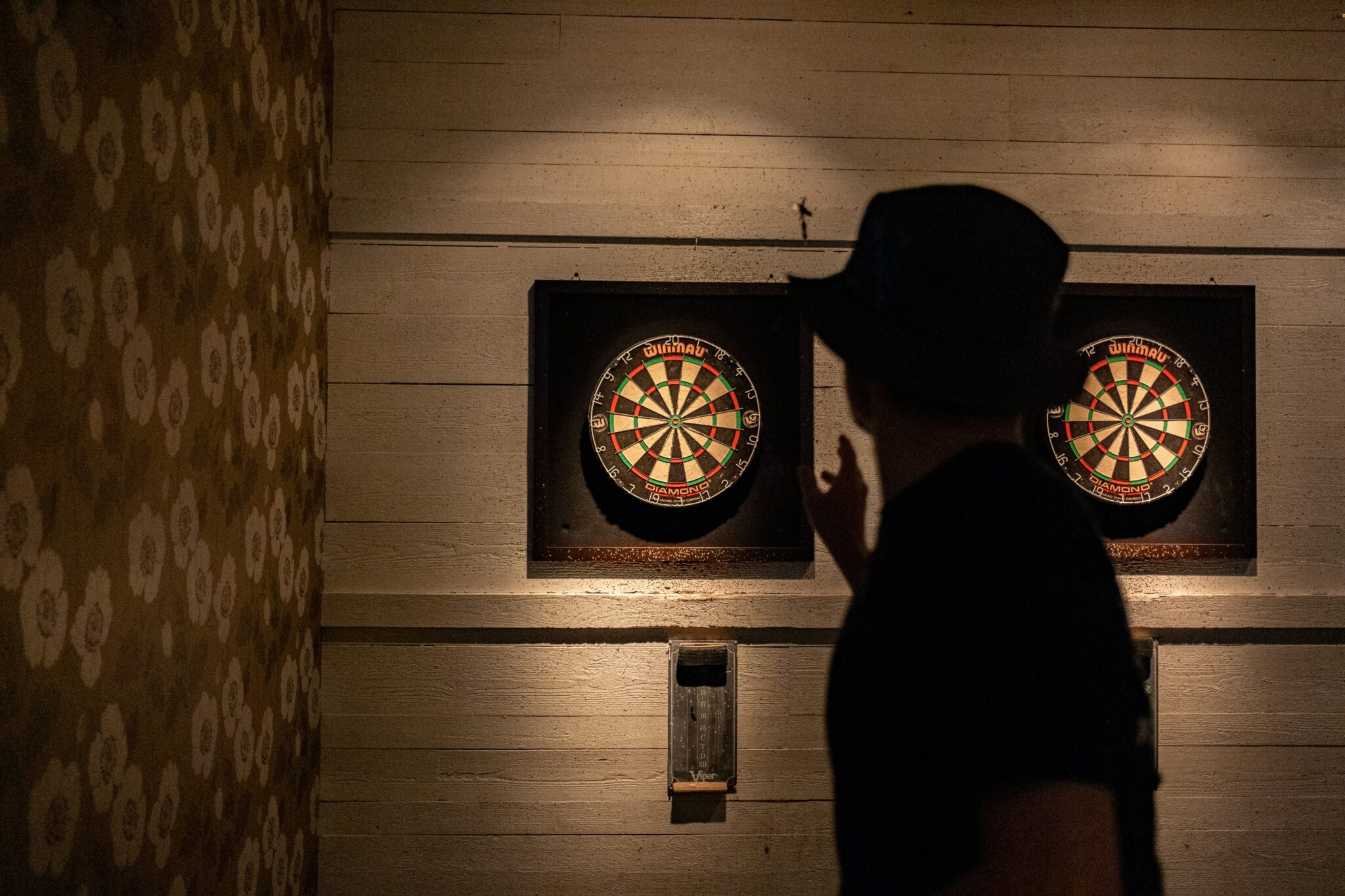 someone playing darts