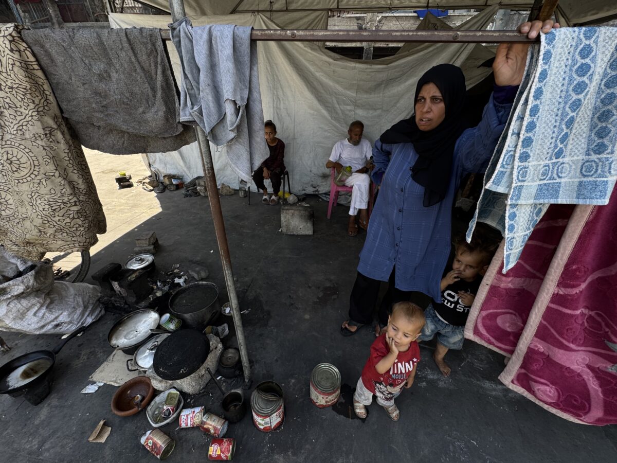 Displaced Palestinian families in Khan Younis city in July 2025. (Credit: © Abdallah Alattar/APA Images via ZUMA)