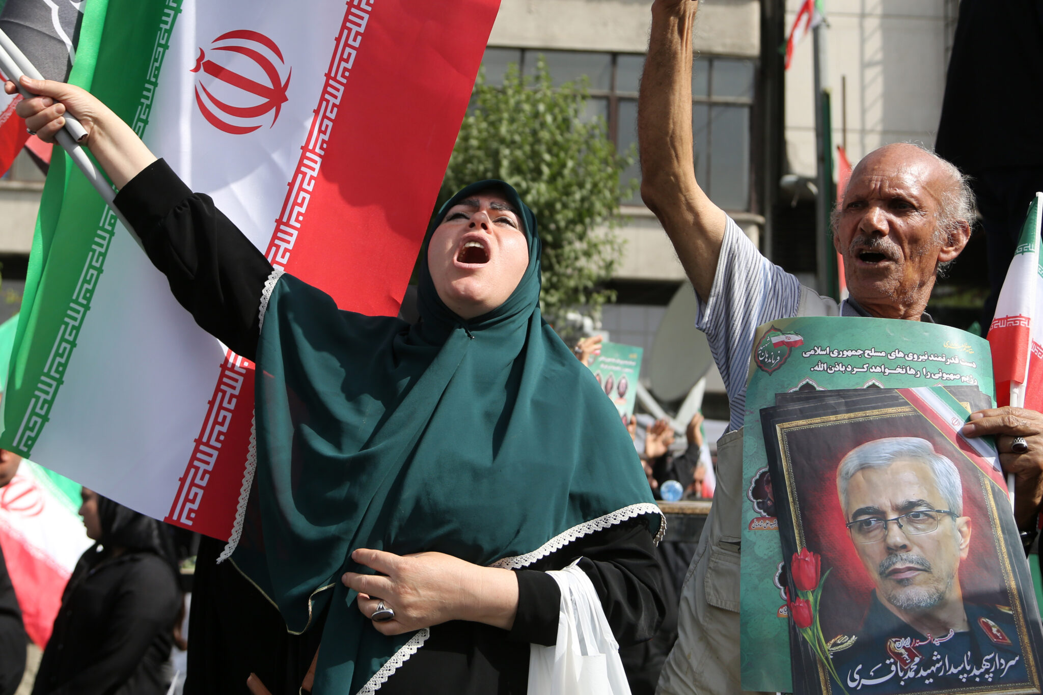 photo of iranian woman and flag