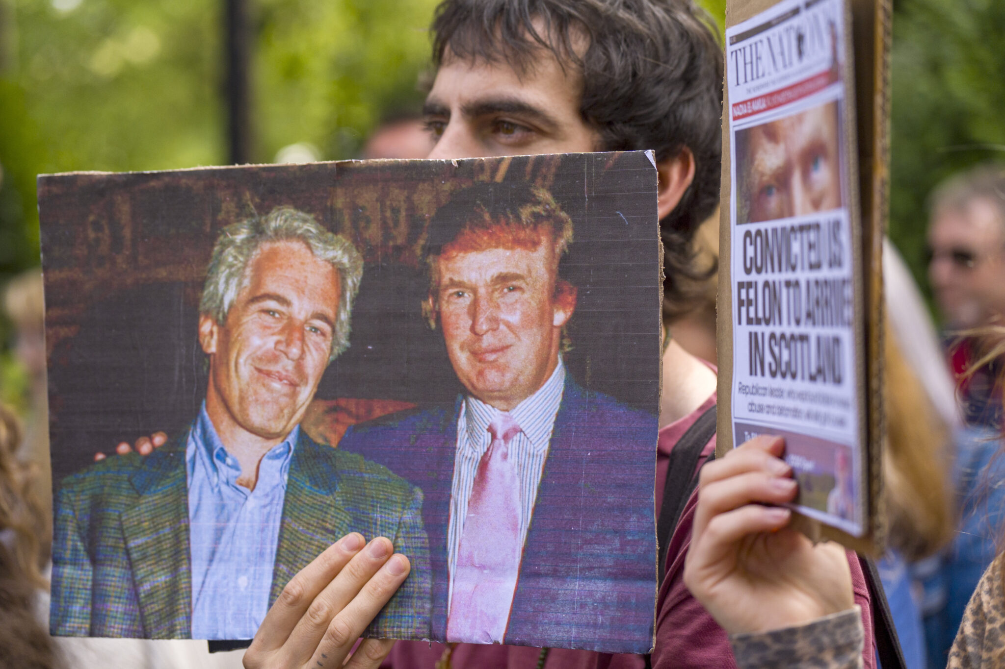 A photo of Epstein and Trump at the Stop Trump Scotland protest outside the U.S. Consulate in Edinburgh, on July 26.