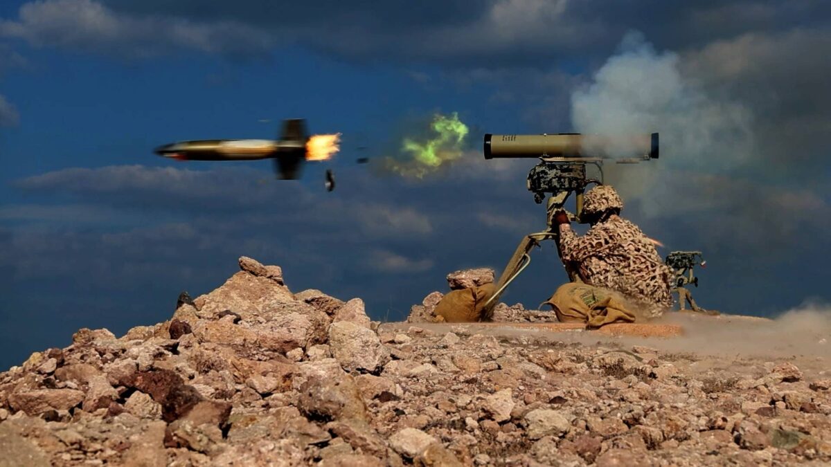 A soldier firing a weapon during an Islamic Revolutionary Guards Corps (IRGC) military exercise in the Persian Gulf, southern Iran on January 24, 2025.