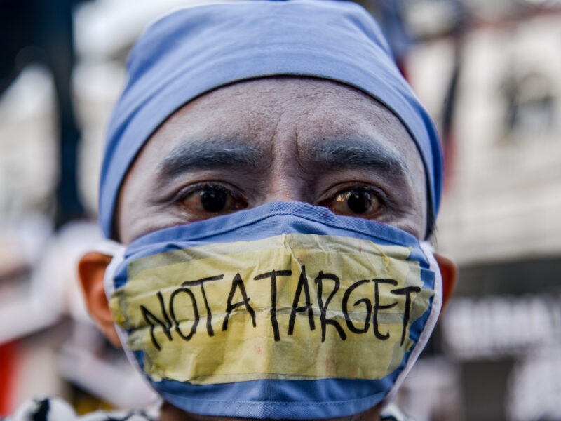 A pantomime artist dressed as a paramedic is seen at a solidarity rally for Palestine in Bandung, Indonesia, over the weekend. The protesters urged the end to the attacks launched by the Israel Defense Forces (IDF) and the immediate liberation of Palestine.