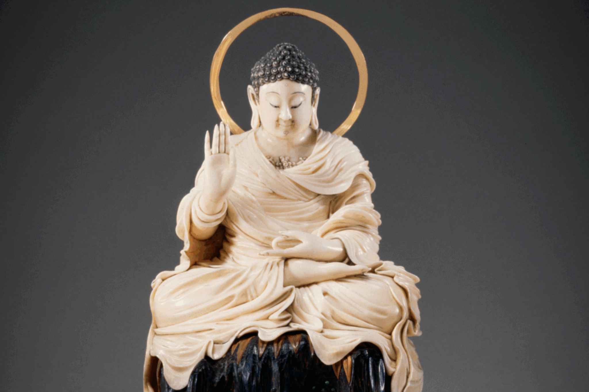 A 19th century Seated Buddha (Meiji era) made of ivory and gold, Japan.