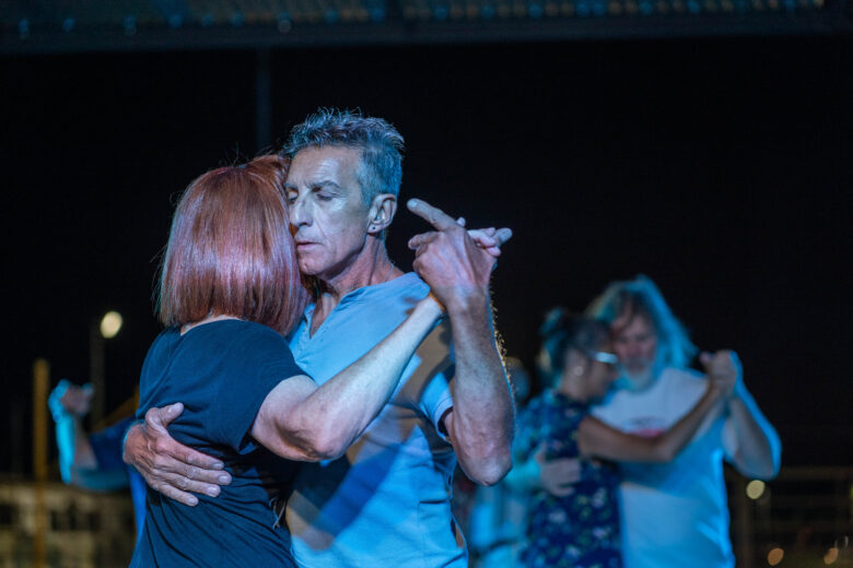 Dancers gather to dance the tango in a small square in Firmat, Santa Fe, Argentina.