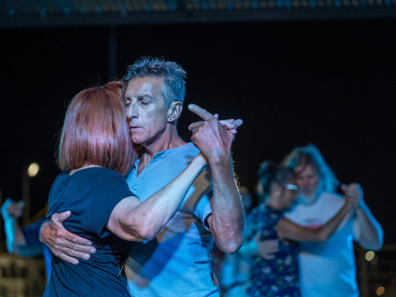 Dancers gather to dance the tango in a small square in Firmat, Santa Fe, Argentina.