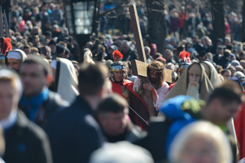 Jesus carries the cross, a scene from a reenactment of the Way of the Cross in Kalwaria Zebrzydowska onn Friday, March 30, 2018, in Kalwaria Zebrzydowska, Poland.