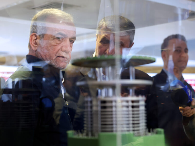 Photo of Iranian President Masoud Pezeshkian and the head of the atomic organization Mohammad Eslami.
