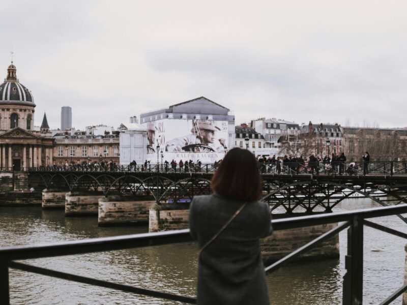 Photo of a woman overlooking a city