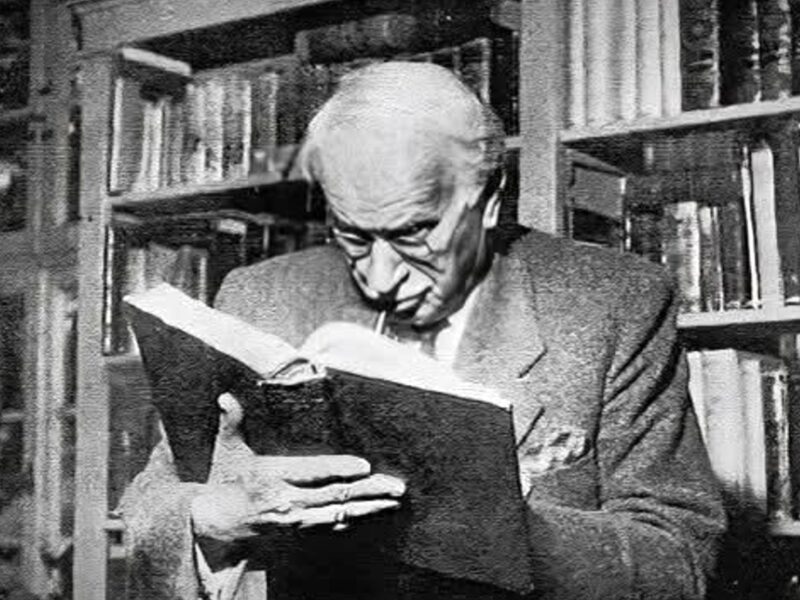 Carl Jung reading a book.