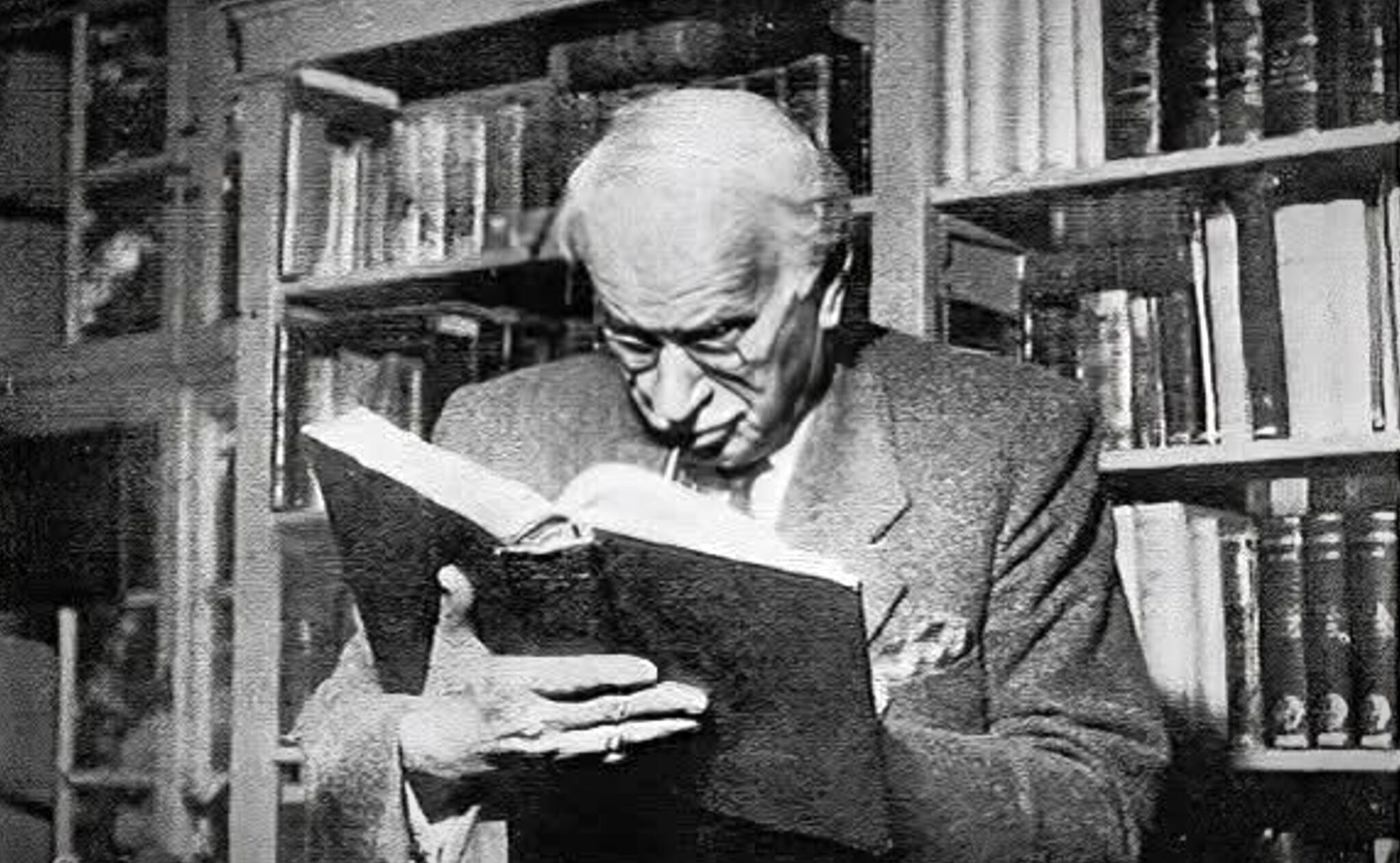 Carl Jung reading a book.