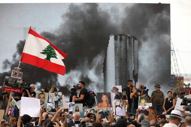 People take part in a march to commemorate the victims of the Beirut port blast in Beirut, Lebanon, on Aug. 4, 2025. Hundreds of people gathered in Martyrs' Square and marched toward the port to commemorate the tragedy.