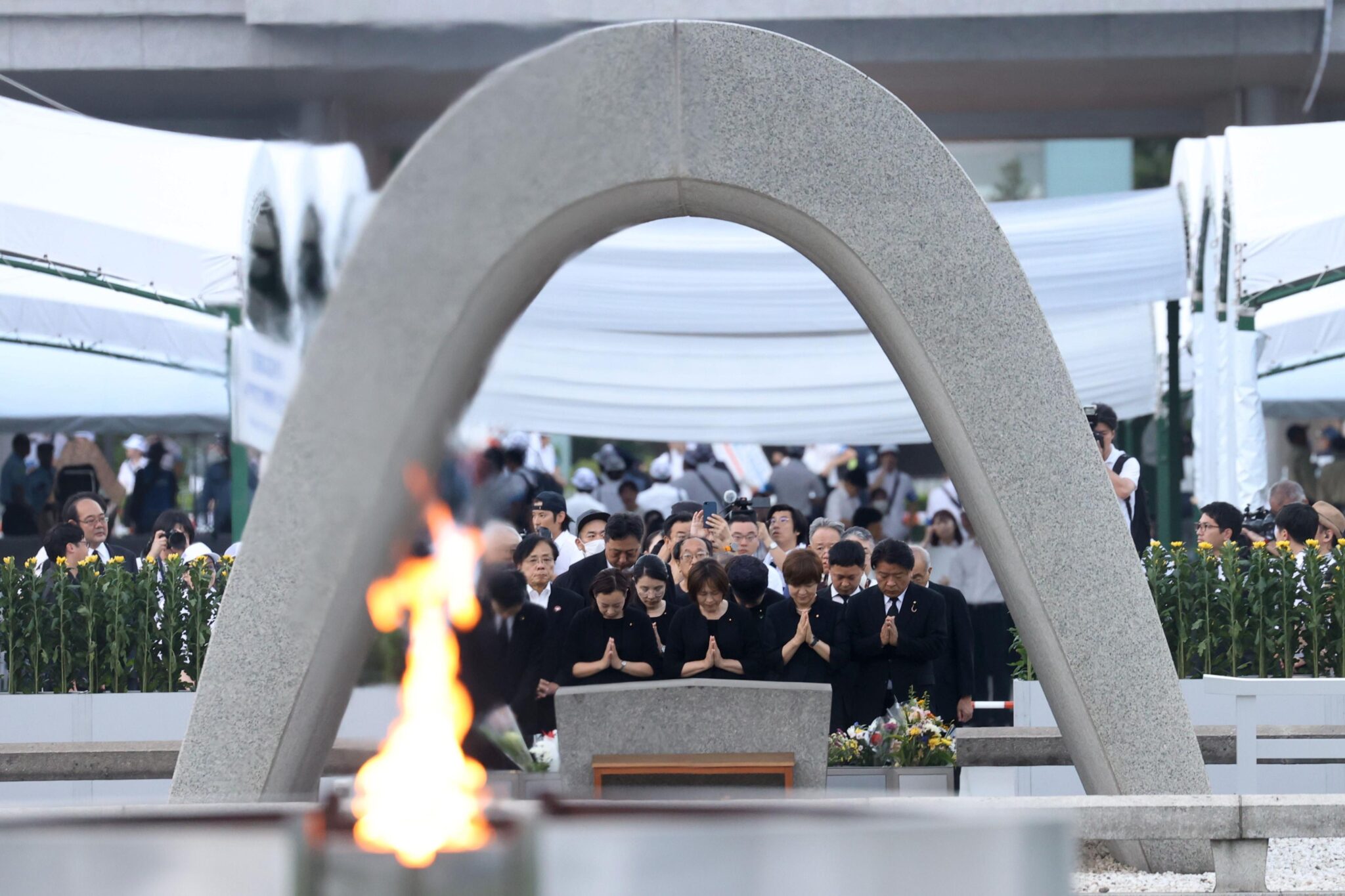 People gathered to pray at the Peace Memorial Park in Hiroshima, Japan, in commemoration of 80 years since the U.S. dropped atomic bombs on the city on Aug. 6, 1945, marking the first use of a nuclear weapon in war. More than 100,000 people were killed instantly from the bomb and hundreds of thousands died in the following years from injuries and illnesses caused by the radiation. The use of atom bombs in Hiroshima and, three days later, the nearby city Nagasaki, remain the only times nuclear weapons have been used in warfare. Japan surrendered on Aug. 15.