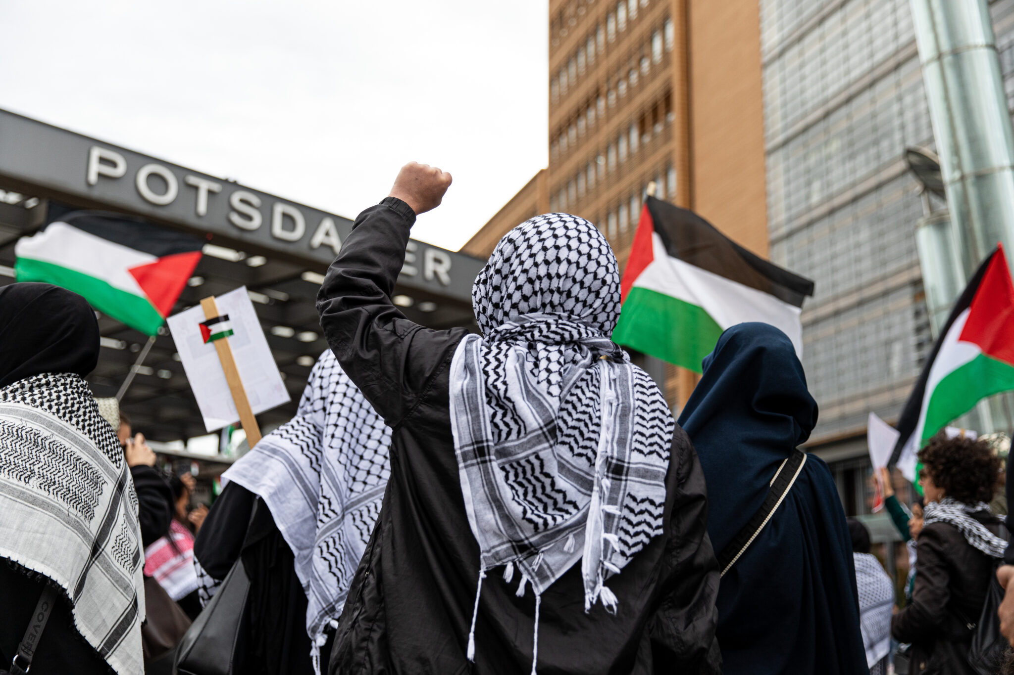 Protesters hold a demonstration at Potsdamer Platz in Berlin, Germany, on August 3, 2025, to call for a ceasefire in Gaza and denounce Israeli military actions.