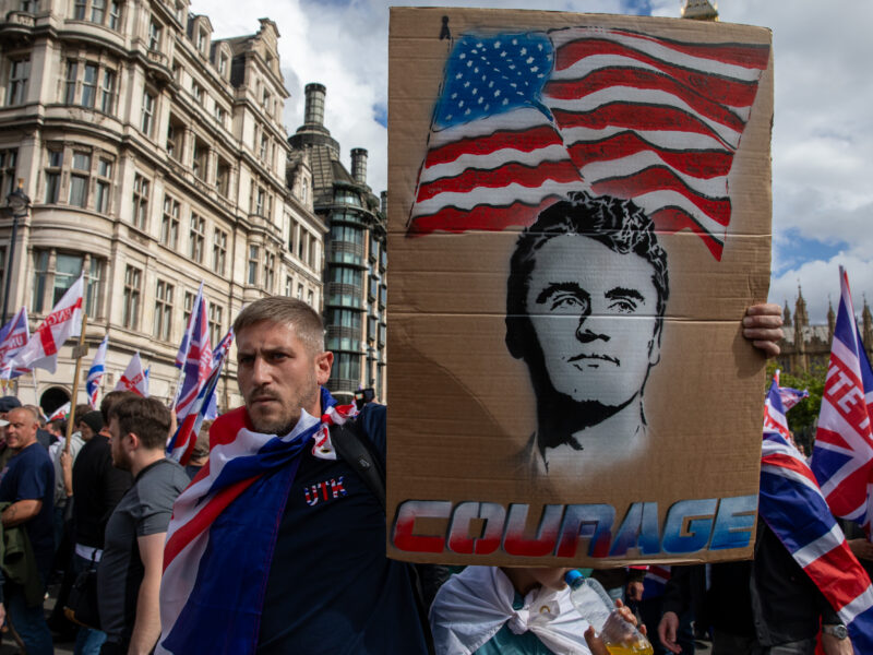 A protestor carries a Charlie Kirk placard during The Unite the Kingdom far-right rally in London held on 13th September 2025.