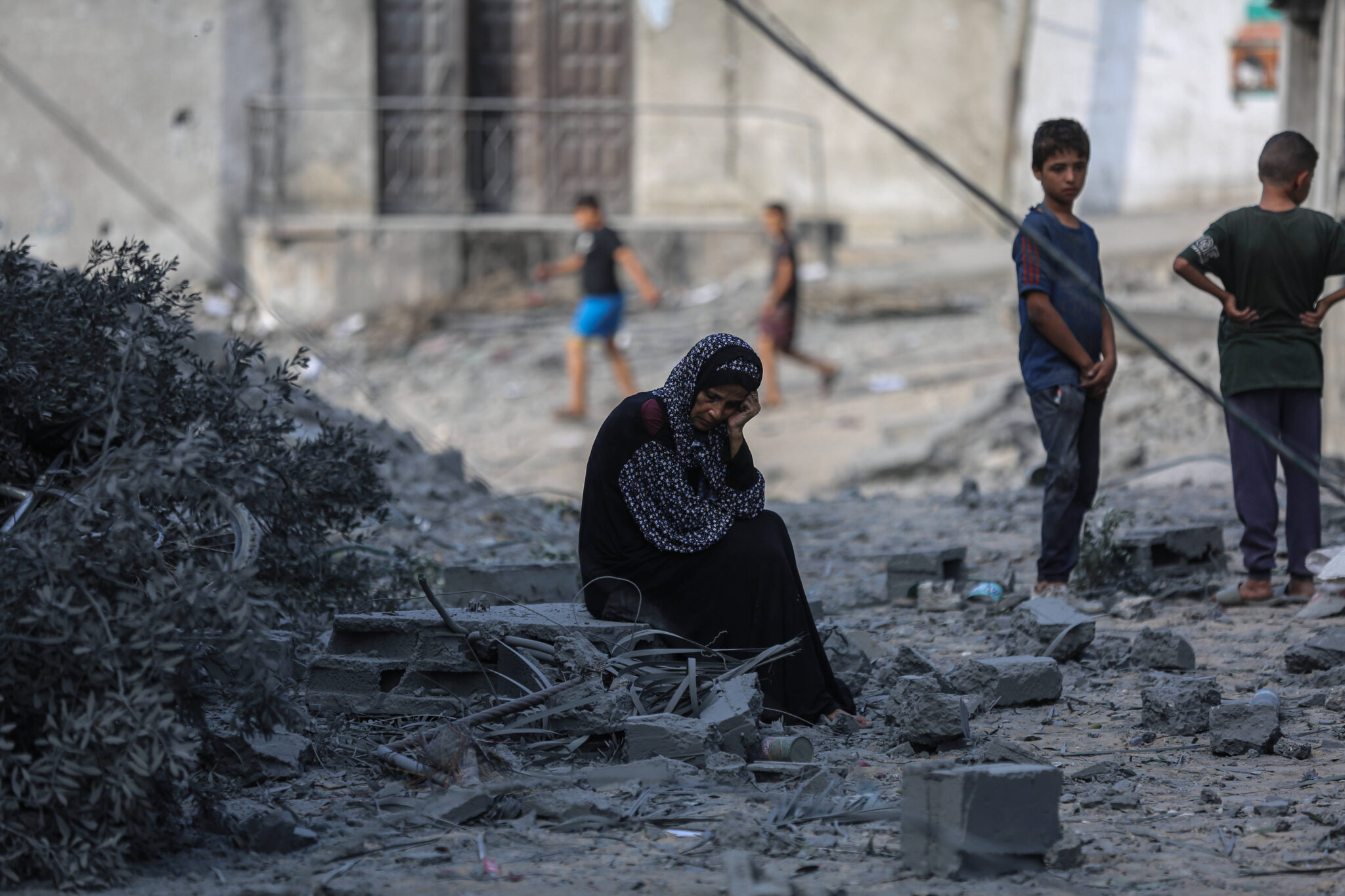 Sept. 8, 2025, Gaza City,Palestinian Territory: Palestinians inspect the damage at the site of an overnight Israeli strike